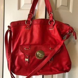 Beautiful red handbag. Not leather but looks like.